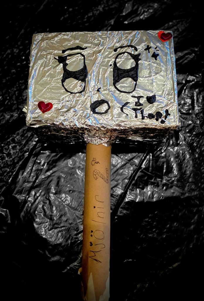 A photo of Thor's handmade tribute to his lost best buddy, Mjolnir.